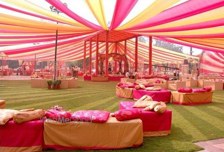 Photo of Pink and Yellow Theme Tent and Seating for Mehendi