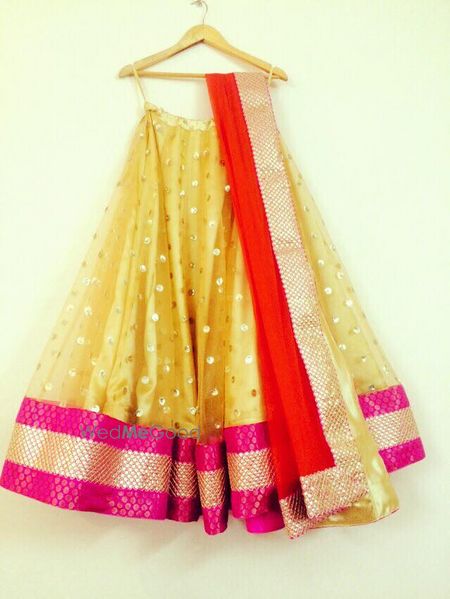 Photo of gold net lehenga