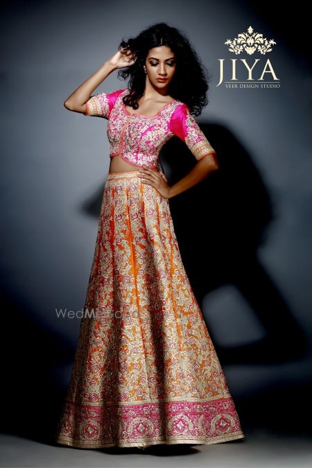 Photo of pink and orange lehenga