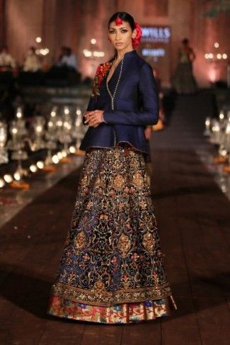 Photo of navy blue lehenga skirt and silk jacket