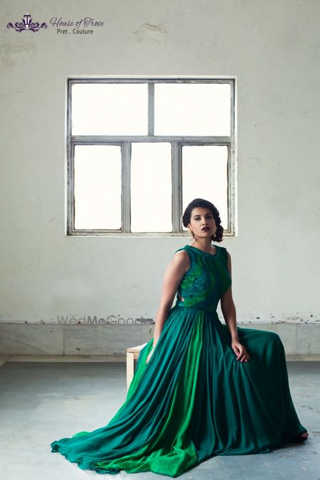 Photo of deep emerald green floor length chiffon gown