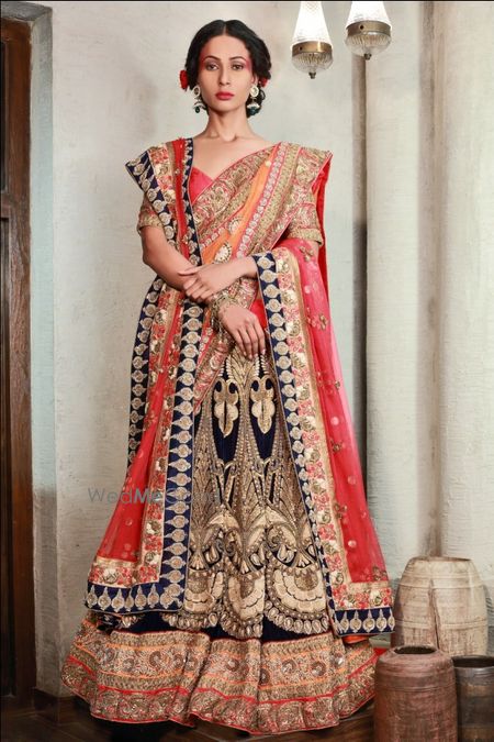 Photo of Red and navy blue bridal velvet lehenga