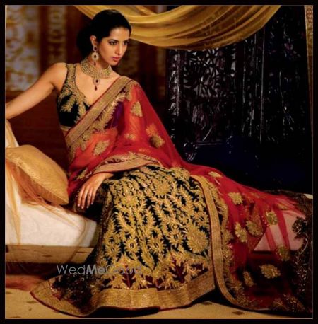 Photo of black and red bridal lehenga