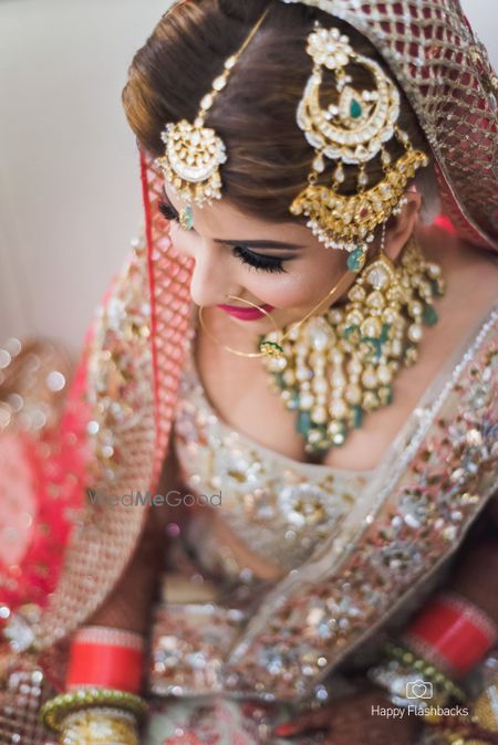 Photo of Heavy bridal hair ornaments jhoomer and maangtikka