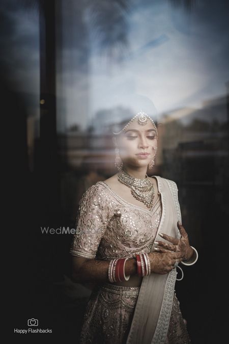 Photo of Bridal portrait by the window