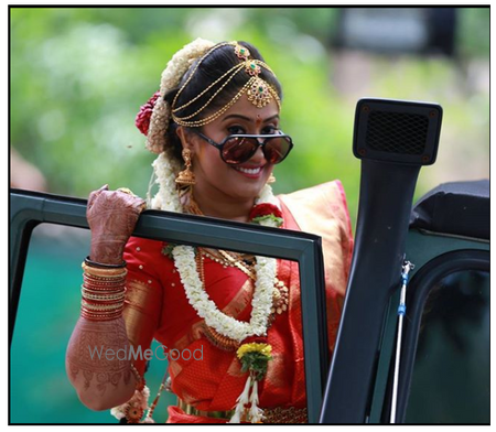 Photo of Unique bridal entry idea on a car