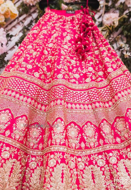 Photo of Red and gold bridal Sabyasachi lehenga