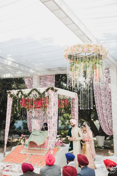 Photo of Mandap with floral drapes