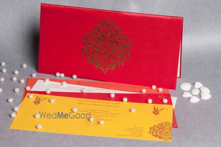 Photo of sold colour wedding invite red and yellow invites