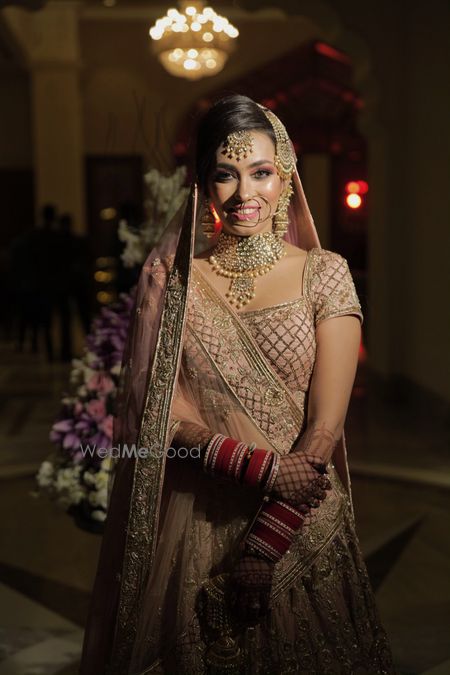 Photo of A stunning bridal portrait with bride in subtle makeup