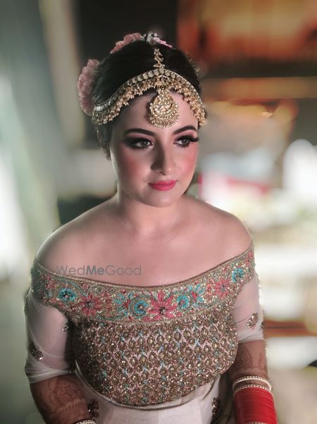 Photo of A bride getting ready for her wedding