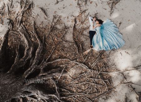 Photo of Stunning couple shot on a beach for a pre wedding shoot