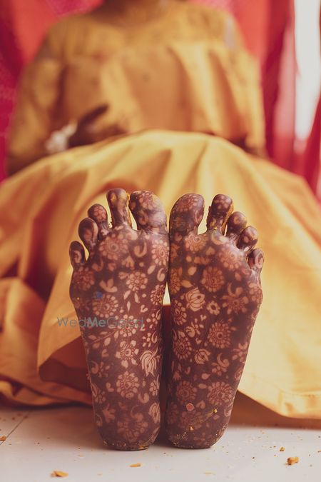 Photo of unique feet mehendi shot on the sole