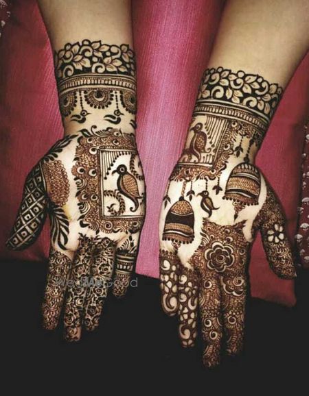 Photo of Unique birds bridal motif mehendi for wedding