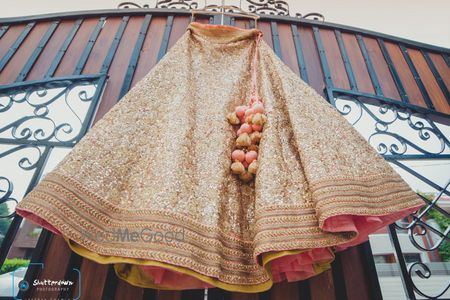 Photo of Sequins Gold Lehenga on a Hanger