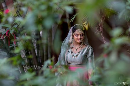 Photo of Bridal portrait of bride in silver lehenga