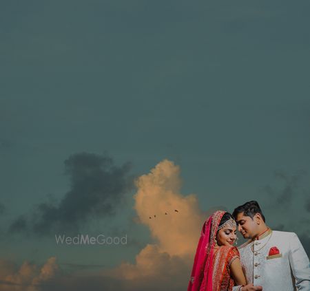 Photo of Wedding day couple shot outdoors