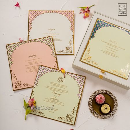 Photo of A simple boxed invite with Moroccan themed leaflets.