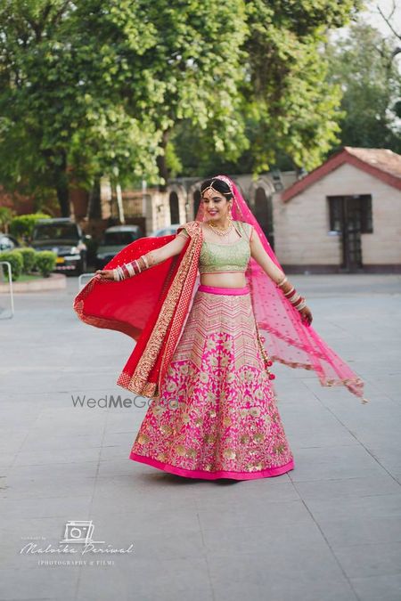 Photo of twirling bride