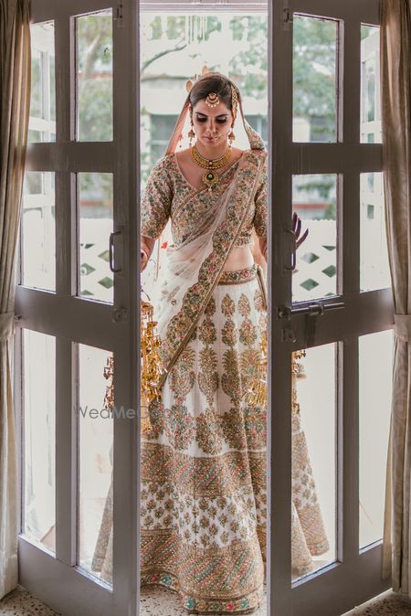 Photo of Bride in white threadwork lehenga