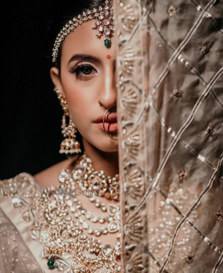 Photo of Subtle bridal makeup with nude lips