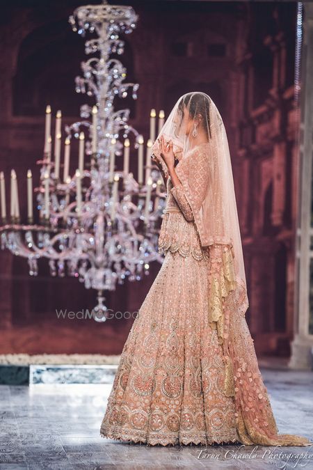 Photo of Tahiliani Shell Pink Zardozi Lehenga with Long Blouse