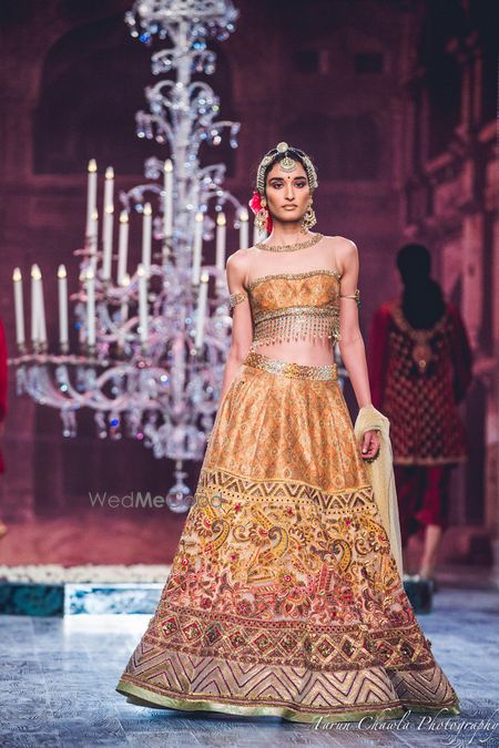 Photo of Tahiliani Mustard Yellow and Pink Thread Work Lehenga