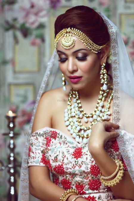 Photo of Smokey eyes with off shoulder lehenga