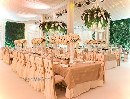 Photo of Glamorous table seating for reception green and white