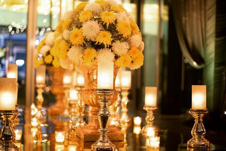 Photo of Floral vases and candles decor