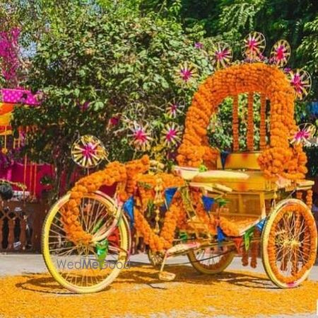 Photo of Floral rikshaw for mehendi decor