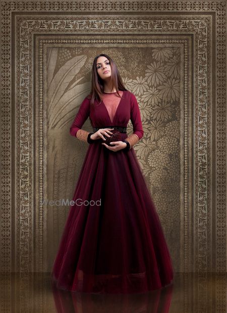 Photo of Wine Colour Gown with Sheer Neck and Full Sleeves