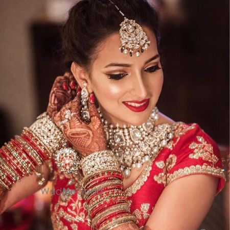 Photo of Bride getting ready shot