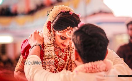 Photo of The bride and groom tie the knot!