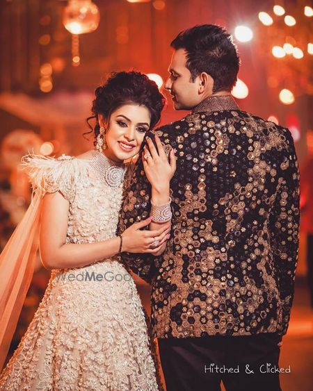 Photo of Bride and groom on sangeet portrait