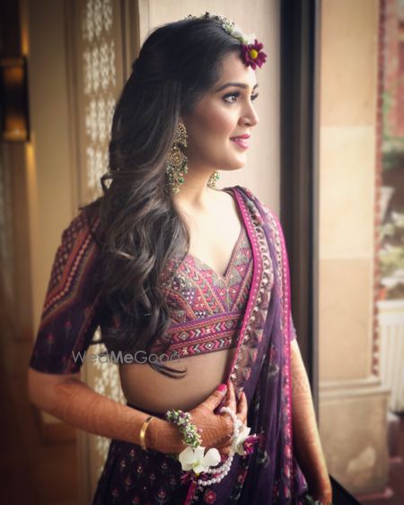 Photo of Mehendi bridal look in purple lehenga