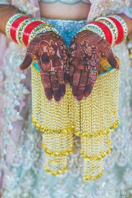 Photo of bride wearing heavy kaleere