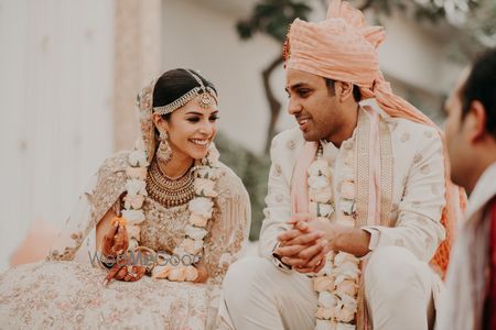 Photo of happy couple shot with both wearing pastels