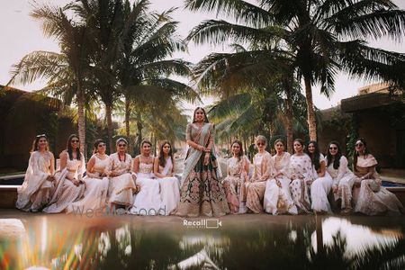 Photo of matching bride with bridesmaids shot