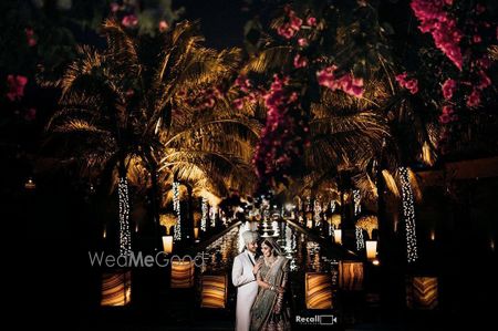 Photo of couple portrait for their night wedding