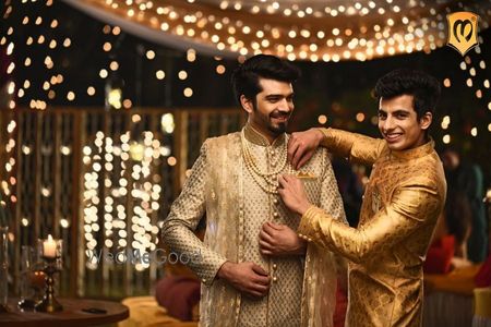 Photo of Brother of the groom doing his duties