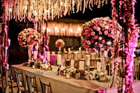 Photo of Light pink and white theme floral table decor