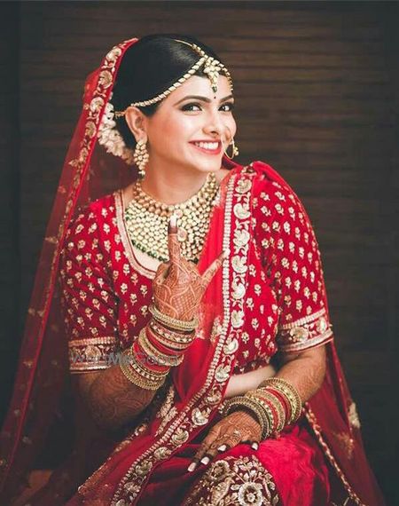 Photo of Cool bridal portrait with bride in red