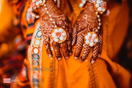 Photo of pearl and floral haathphool for mehendi or haldi