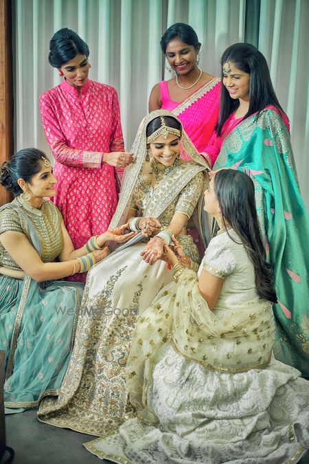 Photo of Bride with her bridesmaids