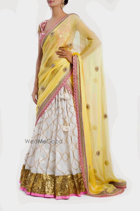 Photo of white yellow and pink lehenga