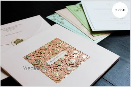 Photo of Peach and White Invites with Laser Cut Gold Design