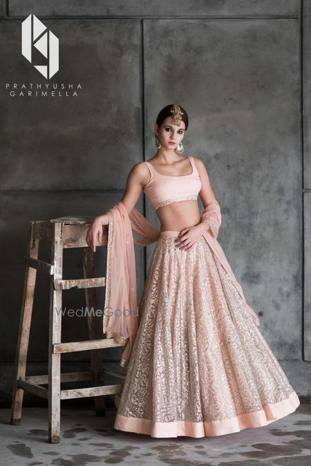 Photo of Shimmery peach engagement lehenga