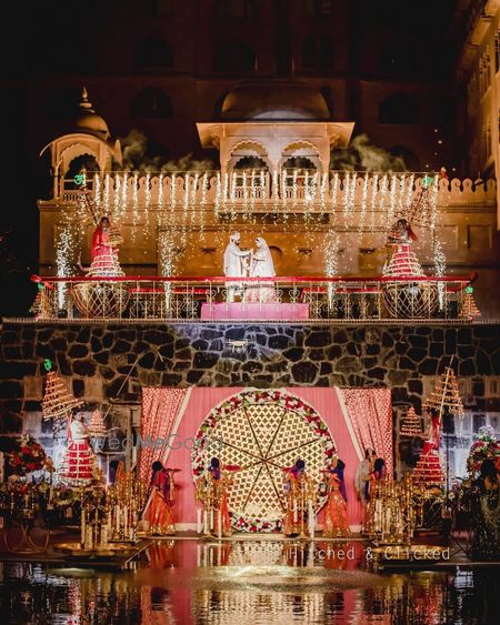 Photo of grand wedding jaimala stage decor