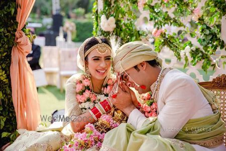 Photo of cute candid couple shot on wedding day